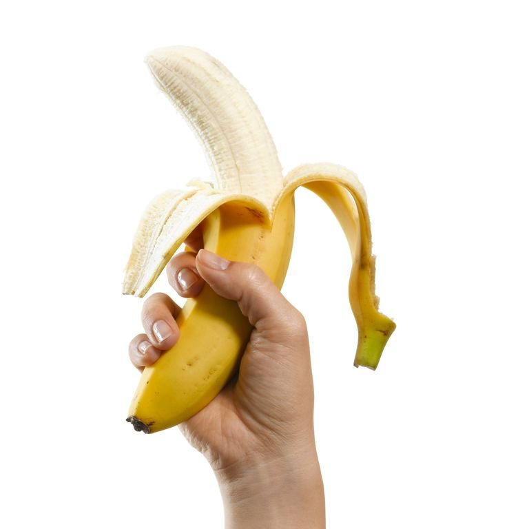 woman-holding-peeled-banana-royalty-free-image-83927951-1561140818.jpg