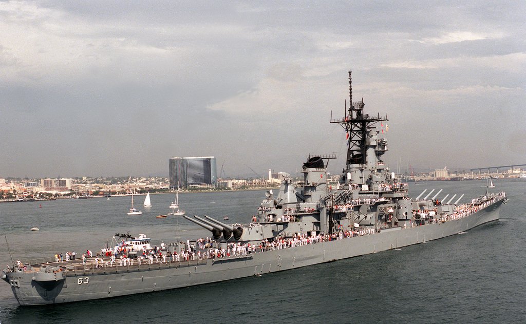 tugs-maneuver-the-battleship-uss-missouri-bb-63-into-a-berth-at-the-air-station-e838db-1024.jpg