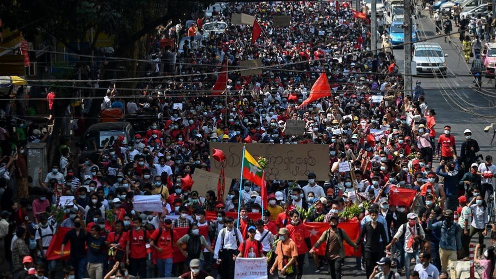 protesters-march-during-a-demonstration-against-the-military-coup-in-yangon.jpg