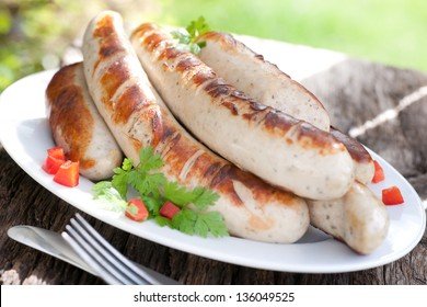 fried-sausage-on-plate-260nw-136049525.jpg