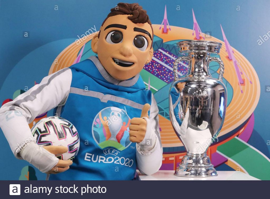 st-petersburg-russia-3rd-mar-2021-uefa-euro-2020-mascot-skillzy-poses-for-a-photo-with-the-hen...jpg