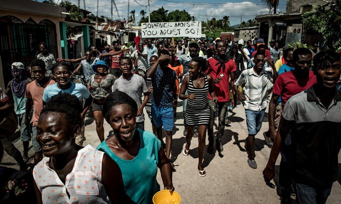 07haiti-timeline-crowds-jumbo-1826-1625744714.jpg