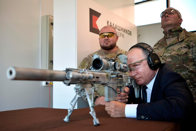 Russian President Vladimir Putin with a Kalashnikov SVCh-308 sniper rifle.png