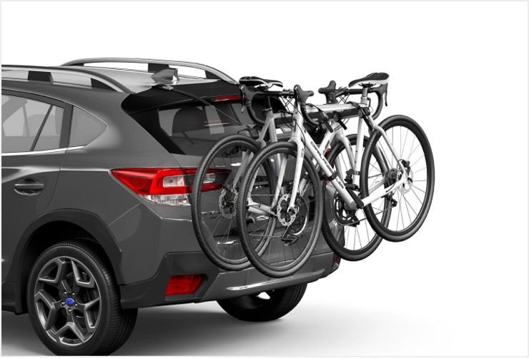 a-car-with-a-thule-trunk-bike-rack-installed-and-two-bikes-loaded.jpg