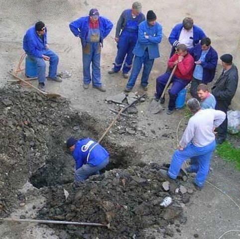 managers-digging-hole.jpg