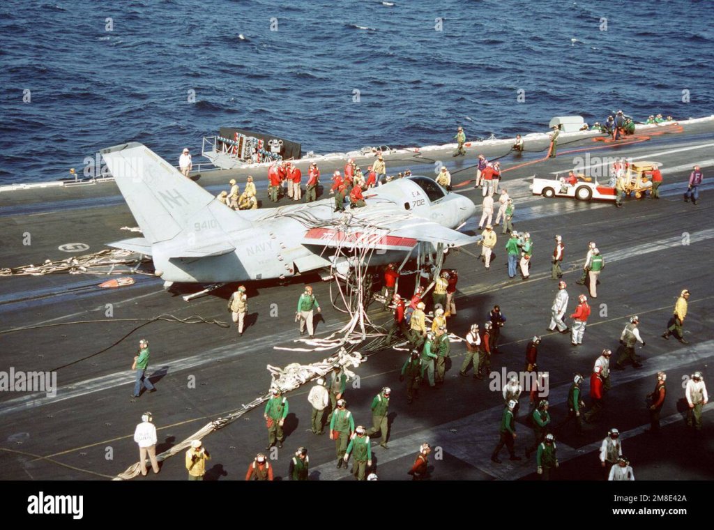 crewmen-aboard-the-nuclear-powered-aircraft-carrier-uss-abraham-lincoln-cvn-72-begin-removing-...jpg