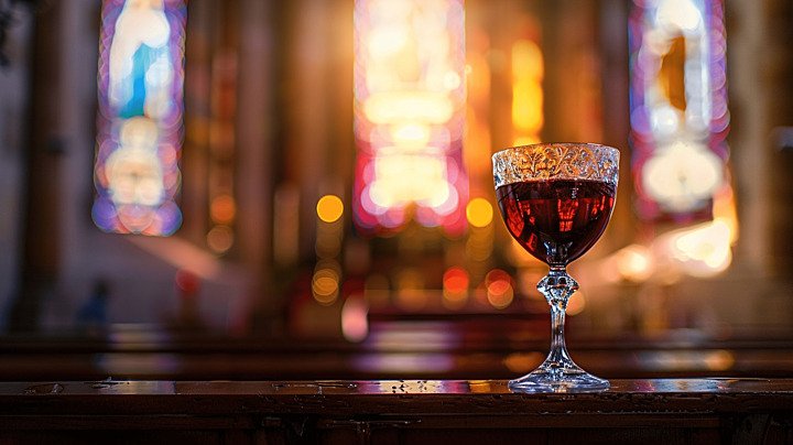 pngtree-a-cup-of-wine-on-the-altar-in-a-catholic-church-image_15672061.jpg