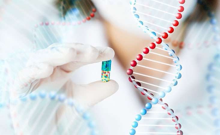 scientist-holding-pill-733x450.jpg