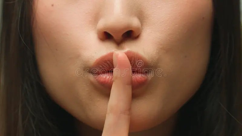 silence-gesture-extreme-close-up-female-mouth-asian-chinese-korean-japanese-woman-unrecognizab...jpg