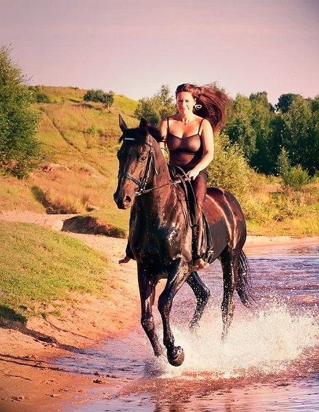 depositphotos_6304437-stock-photo-sexy-women-galloping-on-horse-01.jpeg