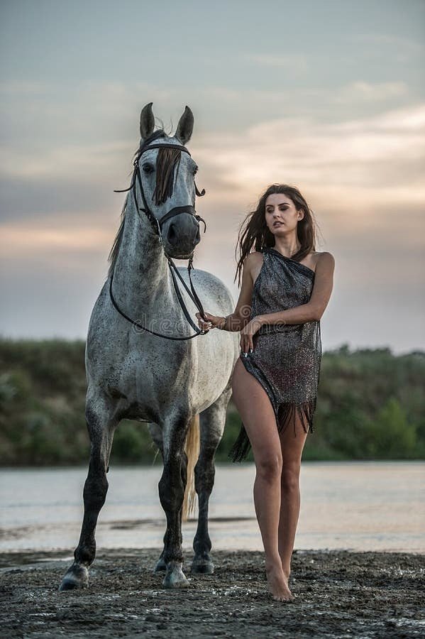 sensual-attractive-girl-interacting-ride-horse-water-sunset-beautiful-brunette-woman-long-hai...jpeg