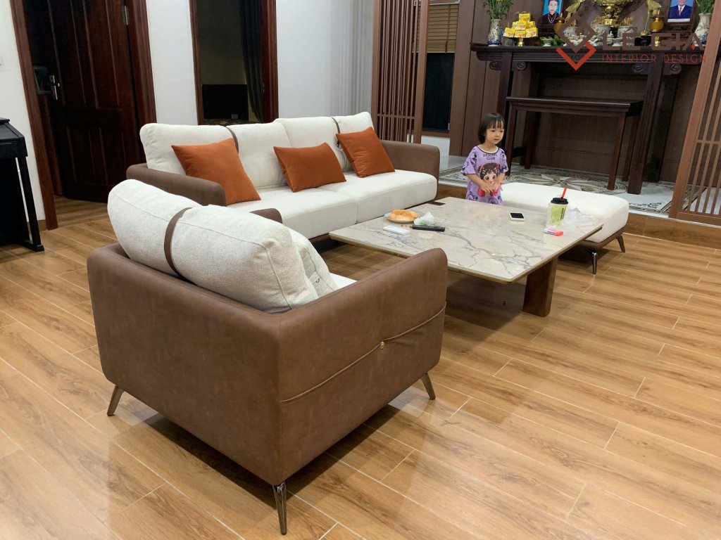 Ảnh chụp thực tế sofa da nỉ phòng khách cao cấp dáng l và văng (725).jpg