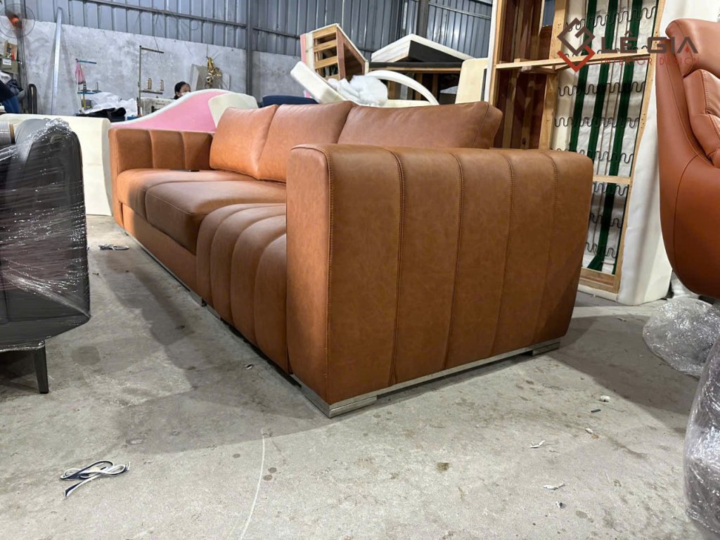 Ảnh chụp thực tế sofa da nỉ phòng khách cao cấp dáng l và văng (734).jpg